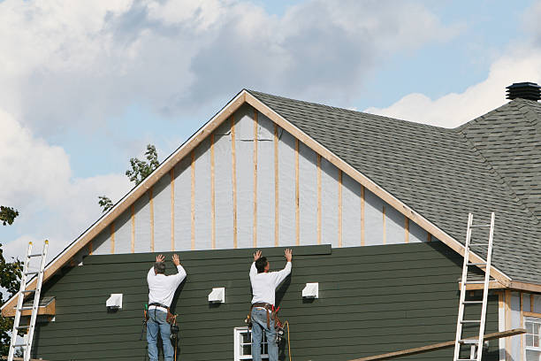 Professional Siding Installation technician working in Bethesda, MD